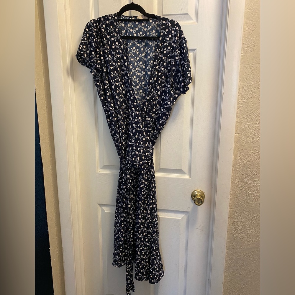 Blue with flowers wrap around dress, size 22 from the loft, never been worn